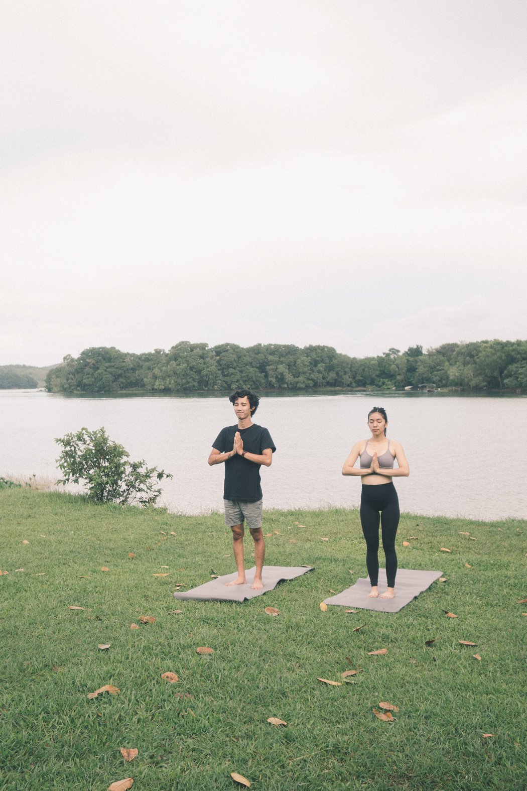 Couple Doing Yoga Outdoors